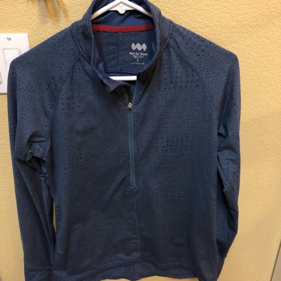 janji running jacket